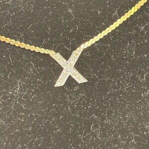 Elegant 14 k Gold and diamond 15 1/2” X Pendant Necklace.
